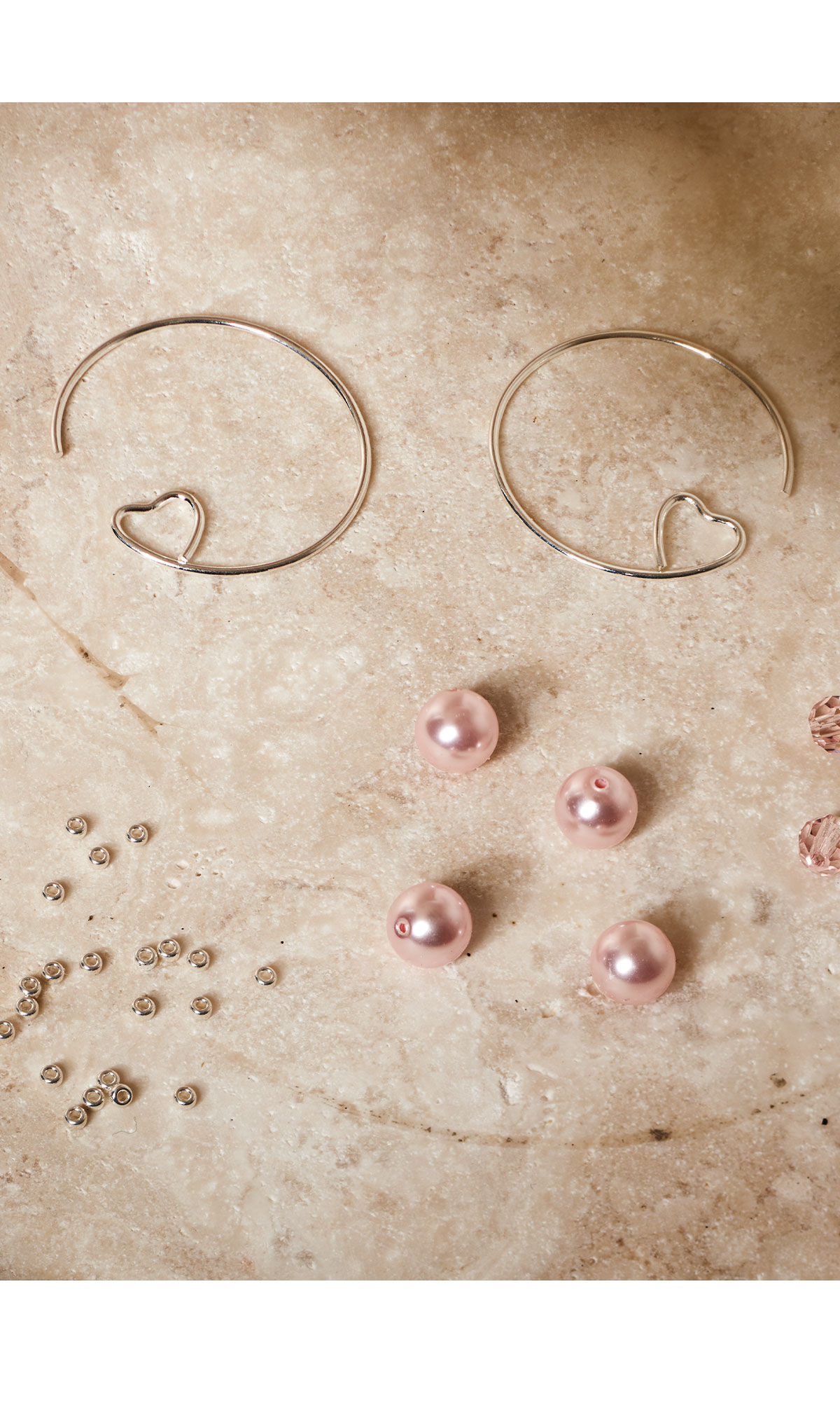 assorted components an beads on stone