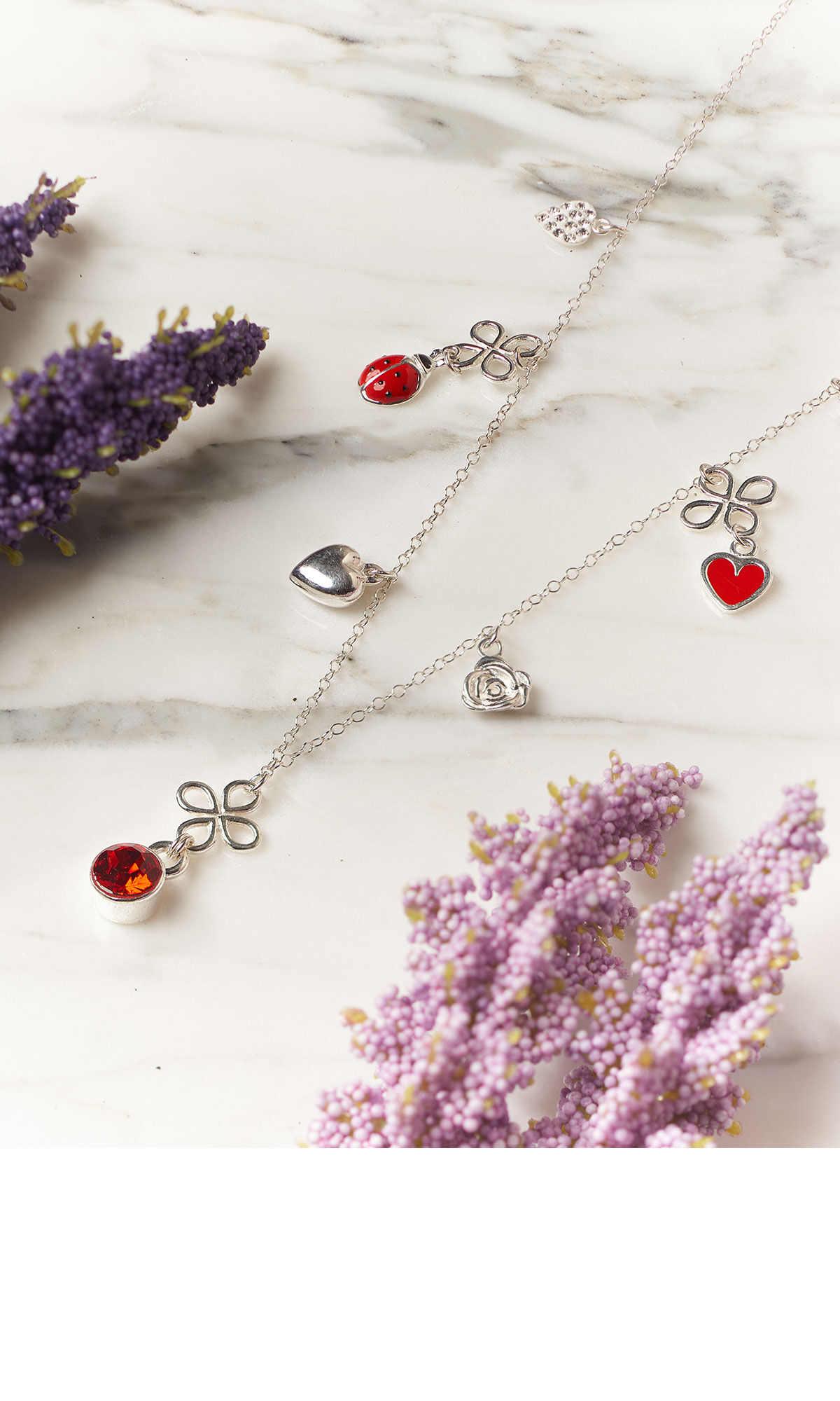 Design Idea RC2M necklace on marble with flowers