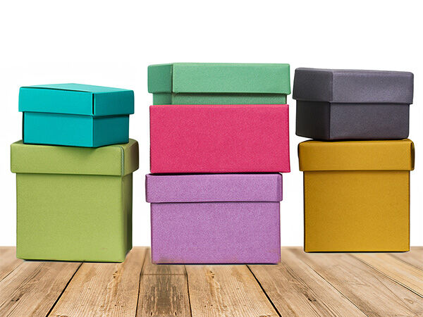 Multicolored paper gift boxes stacked on each other
