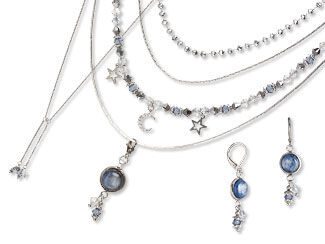 An image of a 5 piece necklace set and earrings with chain and kyanite