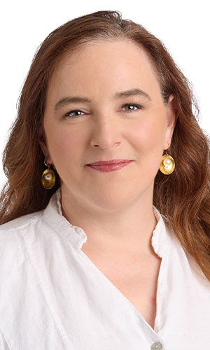 A woman wearing Design Idea R D 2 E