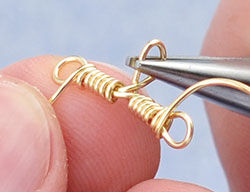 Hands wrapping wire loops