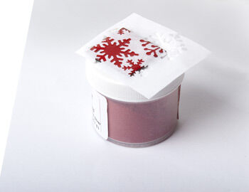 Punched paper over enameled metal