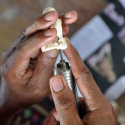 Carving bone using a rotary tool