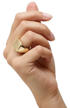 Hand wearing the ring