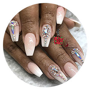 peach nails with embellishments