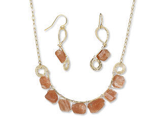 An image of a jewelry set made with sunstone