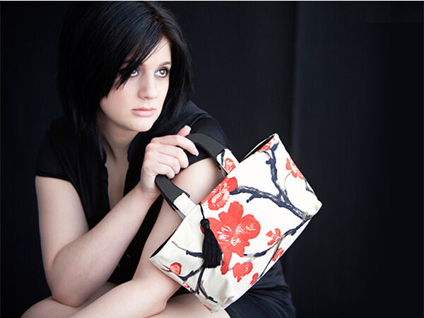 Woman holding a handbag