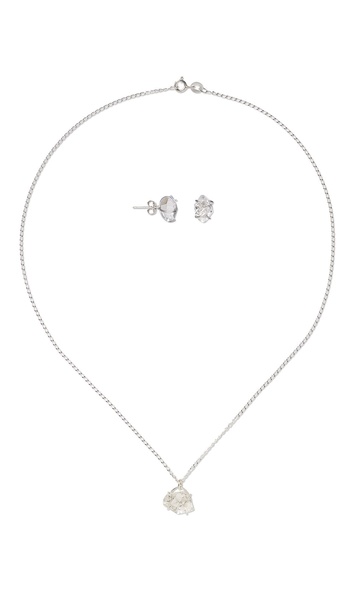 A single strand necklace with a crystal pendant and crystal earrings