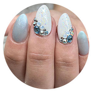 Blue nails with embellishments