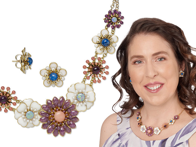 Model wearing necklace and earrings with components