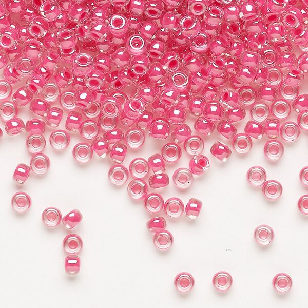 Seed bead, Miyuki, glass, pkg/50g, #8 rocaille, translucent carnation pink-lined luster crystal clear (RR-208). image number 0