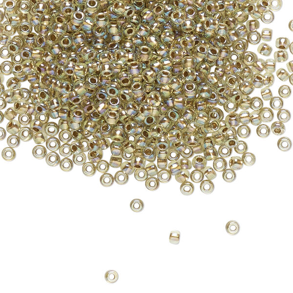 Seed bead, TOHO BEADS®, glass, pkg/50g, #11 round, translucent gold-lined rainbow light jonquil (TR-11-998). image number 0