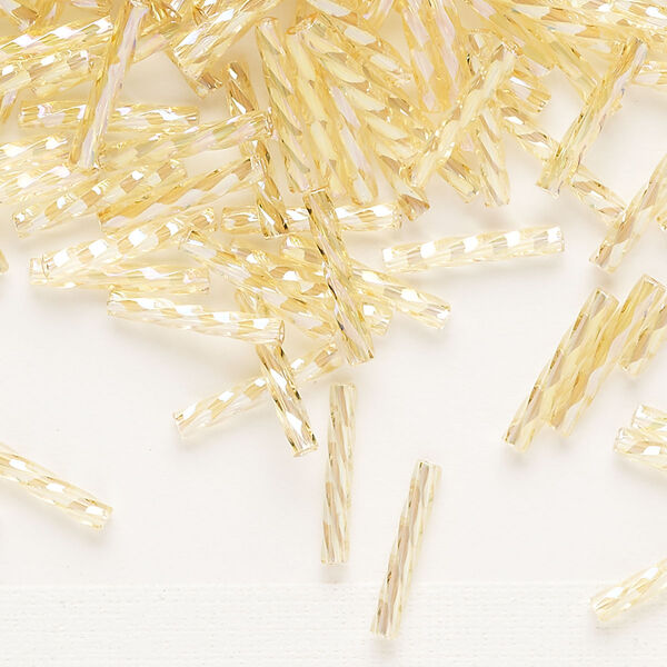 Bugle bead, Dyna-Mites™, glass, transparent rainbow light gold, 12mm twisted. Sold per 50-gram pkg. image number 0