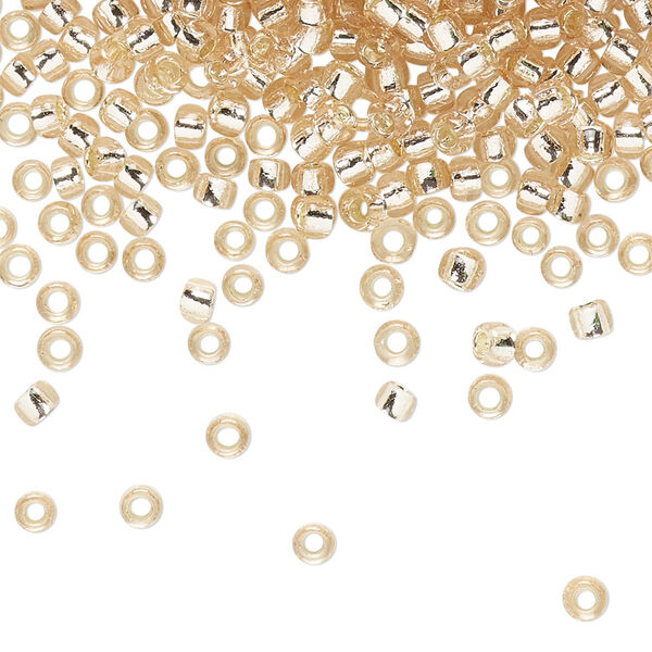Seed bead, TOHO BEADS®, glass, pkg/7.5g, #8 round, transparent silver-lined rosaline (TR-08-31). image number 0
