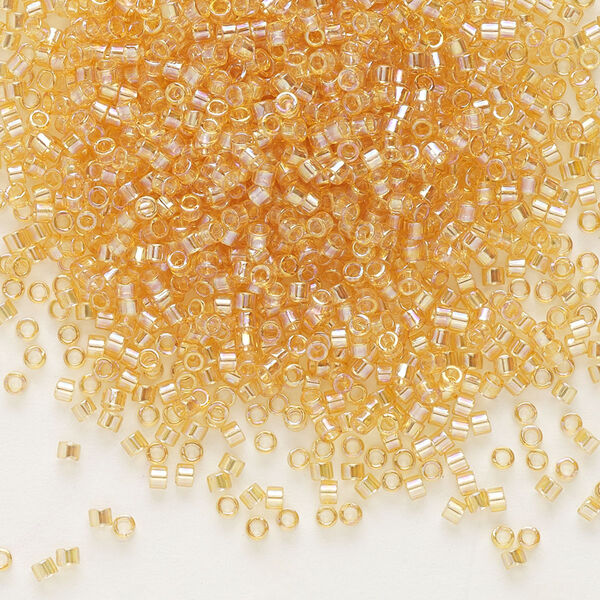 Seed bead, Delica®, glass, pkg/50g, #11 round, translucent rainbow light topaz (DB-0100). image number 0