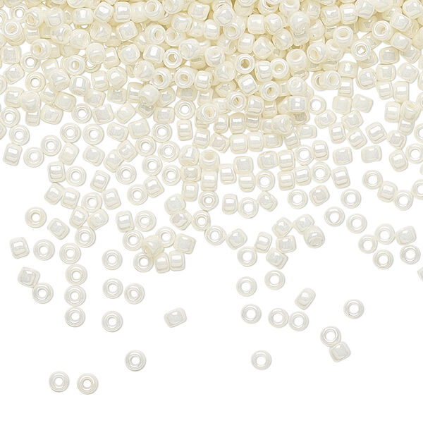Seed bead, TOHO BEADS®, glass, pkg/7.5g, #11 round, opaque luster Navajo white (TR-11-122). image number 0