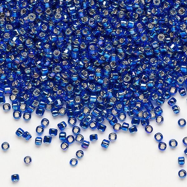 Seed bead, Dyna-Mites™, glass, pkg/40g, #11 round, translucent silver-lined rainbow cobalt blue, (74R:SR 11/0 SR). image number 0