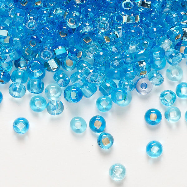 Seed bead glass 1pk opaque and translucent luster silver-lined aqua blue, #6 round 100 gram image number 0