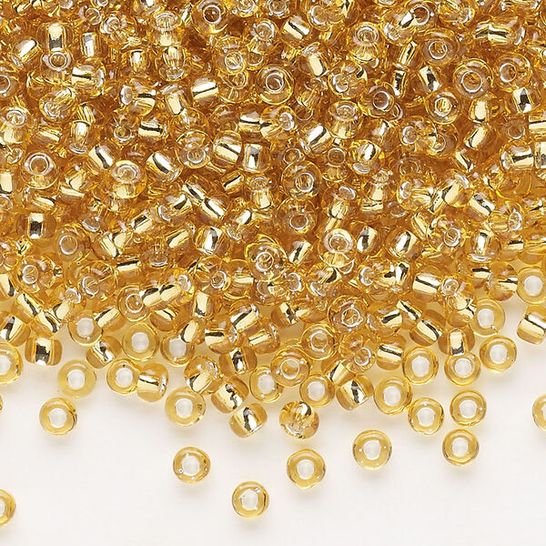 Seed bead, Dyna-Mites™, glass, silver-lined translucent medium gold, #8 round. Sold per 1/2 kilogram pkg. image number 0