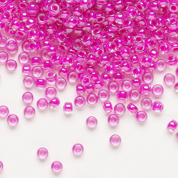 Seed bead, Miyuki, glass, pkg/50g, #8 rocaille, translucent fuchsia-lined luster crystal clear (RR-209). image number 0