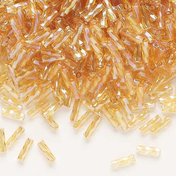 Bugle bead, Dyna-Mites™, glass, translucent rainbow gold, 6mm twisted. Sold per 1/2 kilogram pkg. image number 0