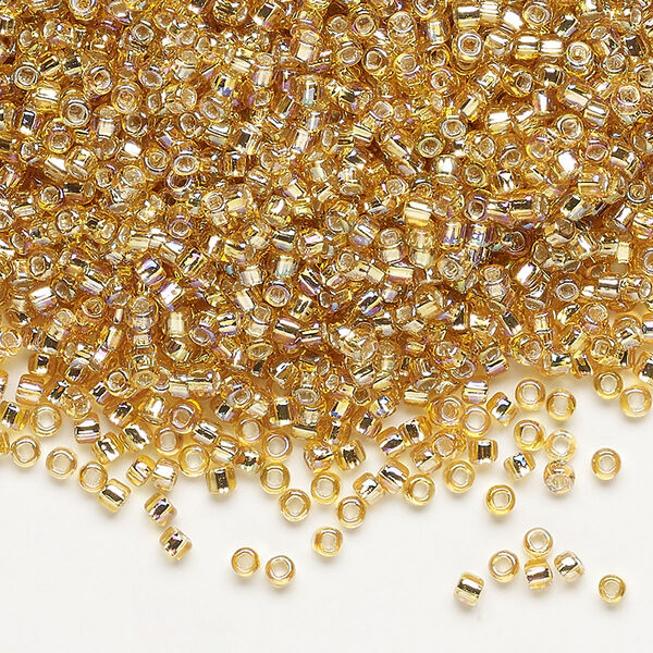 Seed bead, Dyna-Mites™, glass, pkg/1/2kg, #11 round, translucent silver-lined rainbow gold, (62R:SR 11/0 SR). image number 0