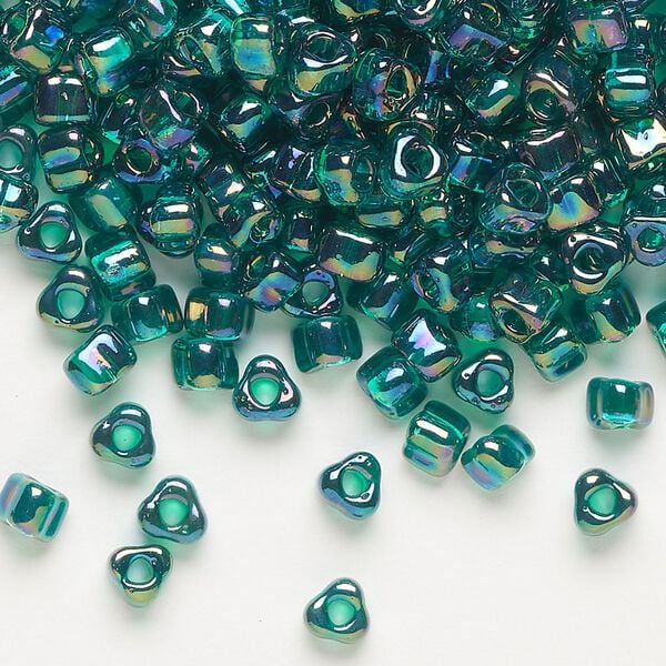 Seed bead, Miyuki, glass, transparent iris teal, (TR1159), #5 triangle. Sold per 25-gram pkg. image number 0