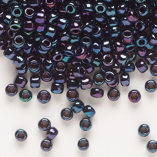 Seed bead, Dyna-Mites™, glass, opaque iris blue, #6 round. Sold per 40-gram pkg. image number 0