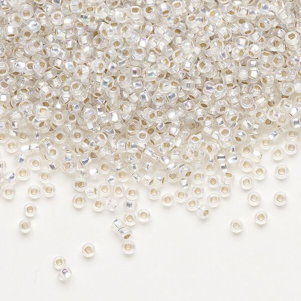 Seed bead, Preciosa Ornela Czech glass, pkg/50g, #11 rocaille, translucent silver-lined rainbow clear, (78109). image number 0