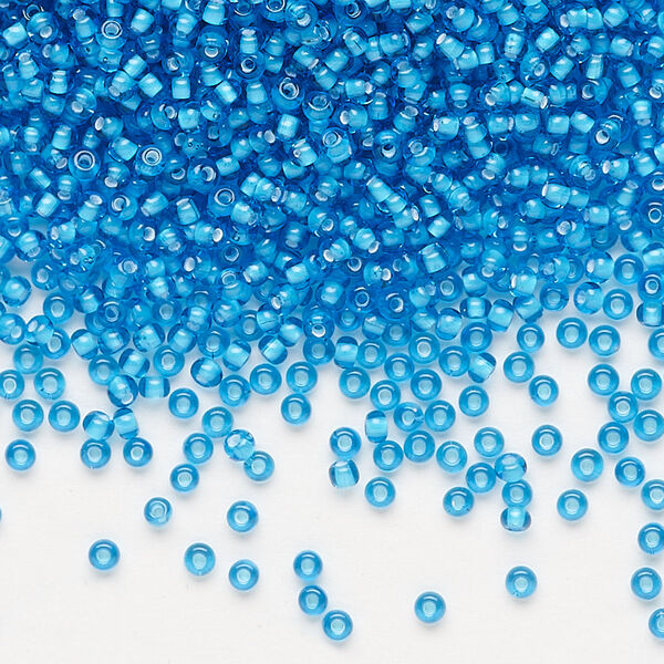Seed bead, Preciosa Ornela, glass, transparent chalkwhite-lined aquamarine, #11 rocaille. Sold per 500-gram pkg. image number 0