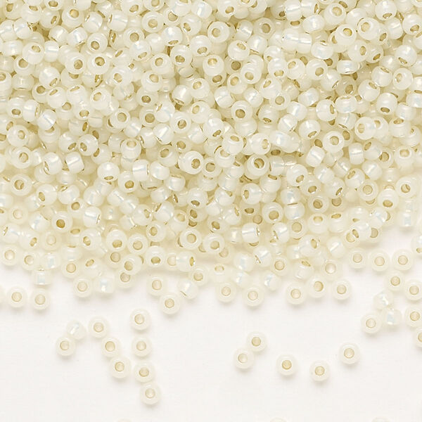 Seed bead, TOHO BEADS®, glass, pkg/50g, #11 round, transparent silver-lined milky light jonquil (TR-11-PF2125). image number 0