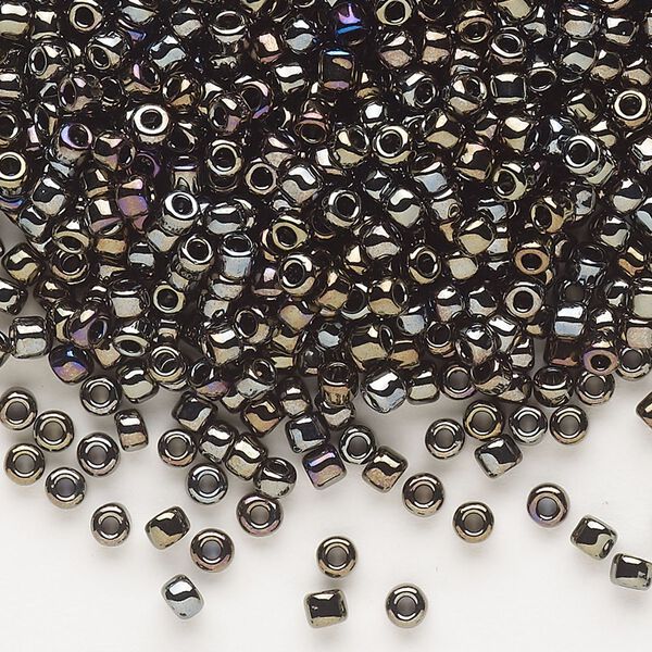 Seed bead, Dyna-Mites™, glass, opaque iris gold, #8 round. Sold per 40-gram pkg. image number 0