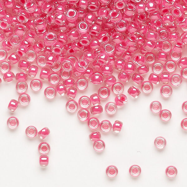 Seed bead, Miyuki, glass, pkg/50g, #8 rocaille, translucent carnation pink-lined luster crystal clear (RR-208). image number 0