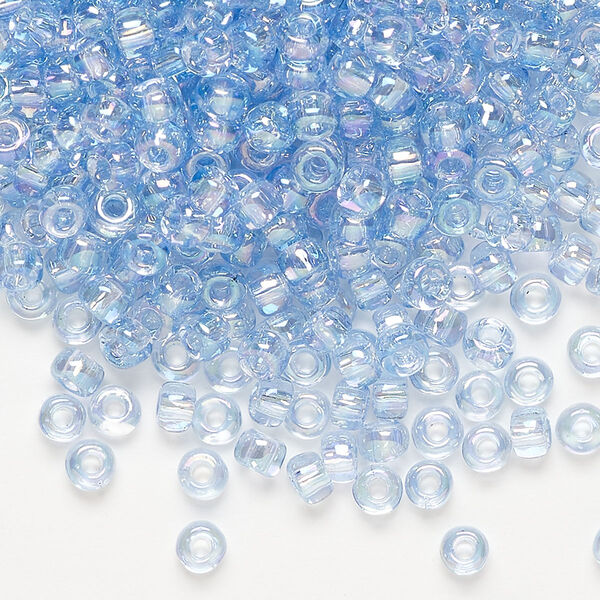 Seed bead, Dyna-Mites™, glass, translucent rainbow light blue, #6 round. Sold per 1/2 kilogram pkg. image number 0