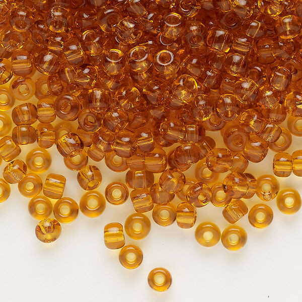 Seed bead, glass, pkg/50g, #6 rocaille, transparent topaz. image number 0