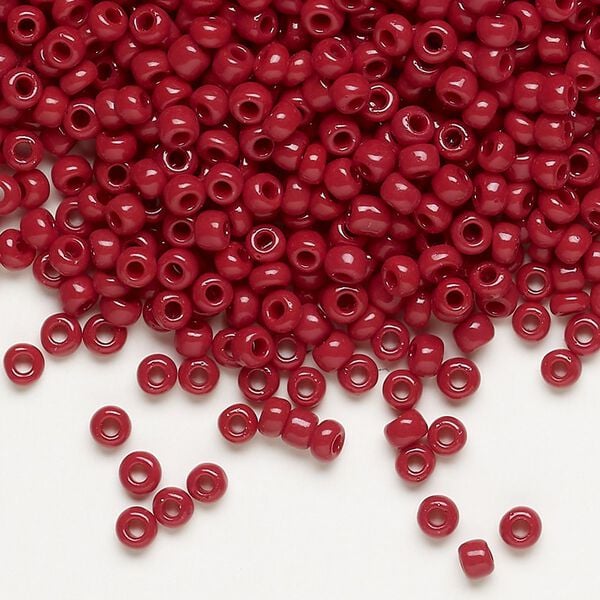 Seed bead, Dyna-Mites™, glass, opaque brick red, #8 round. Sold per 40-gram pkg. image number 0
