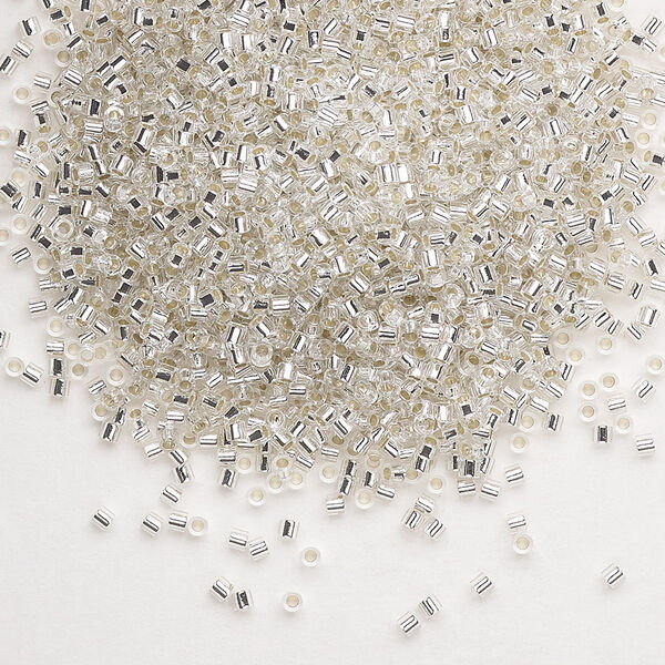 Seed bead, Delica®, glass, pkg/7.5g, #15 round, transparent silver-lined crystal clear (DBS-0041). image number 0