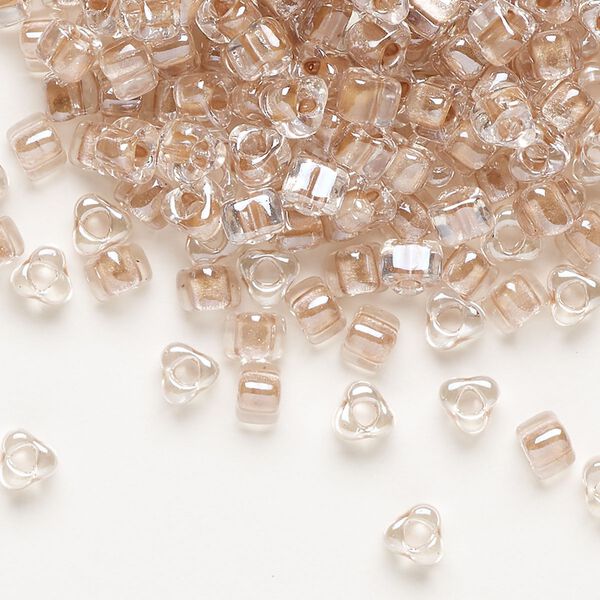 Seed bead, Miyuki, glass, transparent clear color-lined copper, (TR1129), #5 triangle. Sold per 250-gram pkg. image number 0