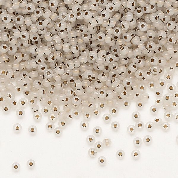 Seed bead, Preciosa Ornela Czech glass, pkg/500g, #11 rocaille, transparent metallic bronze-lined clear, (68106). image number 0