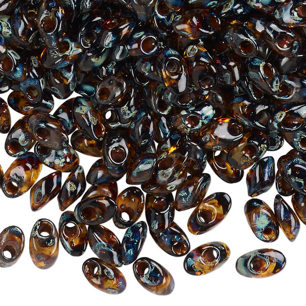Seed bead, Miyuki, glass, pkg/10g, 7x4mm long magatama, transparent Picasso amber brown (LMA-4502). image number 0