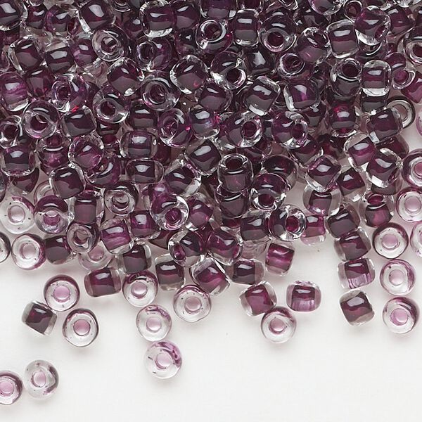 Seed bead, Dyna-Mites™, glass, translucent inside color dark mauve, #6 round. Sold per 1/2 kilogram pkg. image number 0