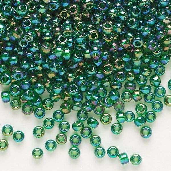 Seed bead, Dyna-Mites™, glass, transparent rainbow emerald green, #8 round. Sold per 1/2 kilogram pkg. image number 0