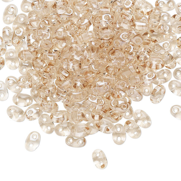Seed bead, Preciosa Twin™ Czech glass, pkg/250g, 5x2.5mm oval, transparent honey crystal clear, (20201). image number 0