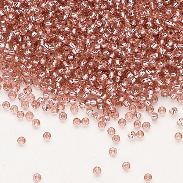 Seed bead, Preciosa Ornela Czech glass, pkg/500g, #11 rocaille, translucent solgel dyed silver-lined medium pink, (78193). image number 0