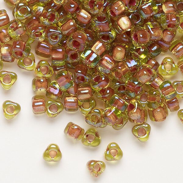 Seed bead, Miyuki, glass, transparent lime color-lined copper, (TR1818), #5 triangle. Sold per 250-gram pkg. image number 0