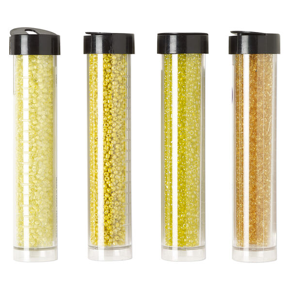 Seed bead assortment, Ming Tree™, glass, pkg/(4) 4 x 3/4 inch vials, #11 round, opaque and transparent color-lined rainbow amber yellow, yellow and cream yellow. image number 0