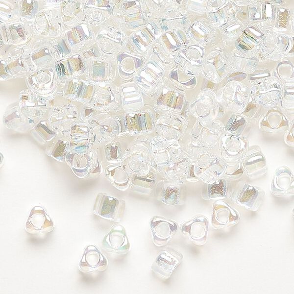 Seed bead, Miyuki, glass, transparent iris clear, (TR1151), #5 triangle. Sold per 250-gram pkg. image number 0
