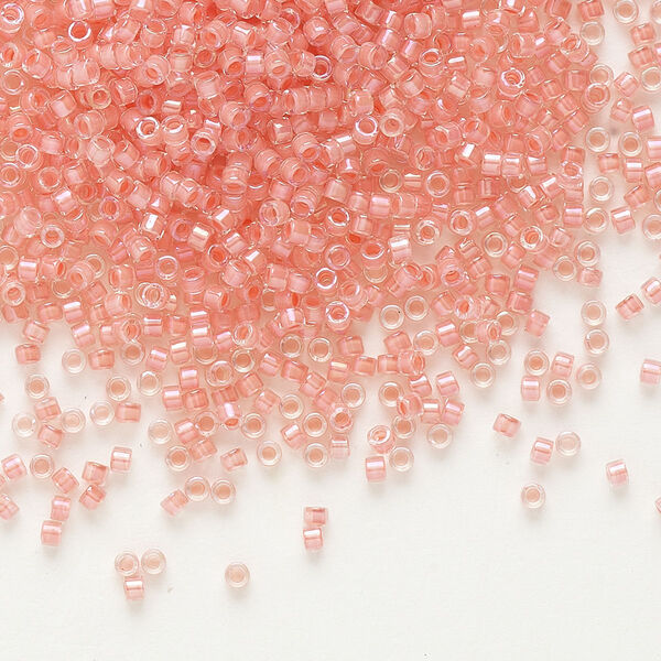 Seed bead, Delica®, glass, pkg/250g, #11 round, translucent coral-lined luster crystal clear (DB-0070). image number 0