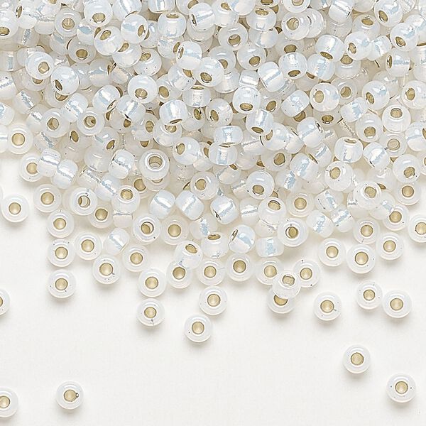 Seed bead, Miyuki, glass, pkg/50g, #8 rocaille, translucent silver-lined opal (RR-551). image number 0